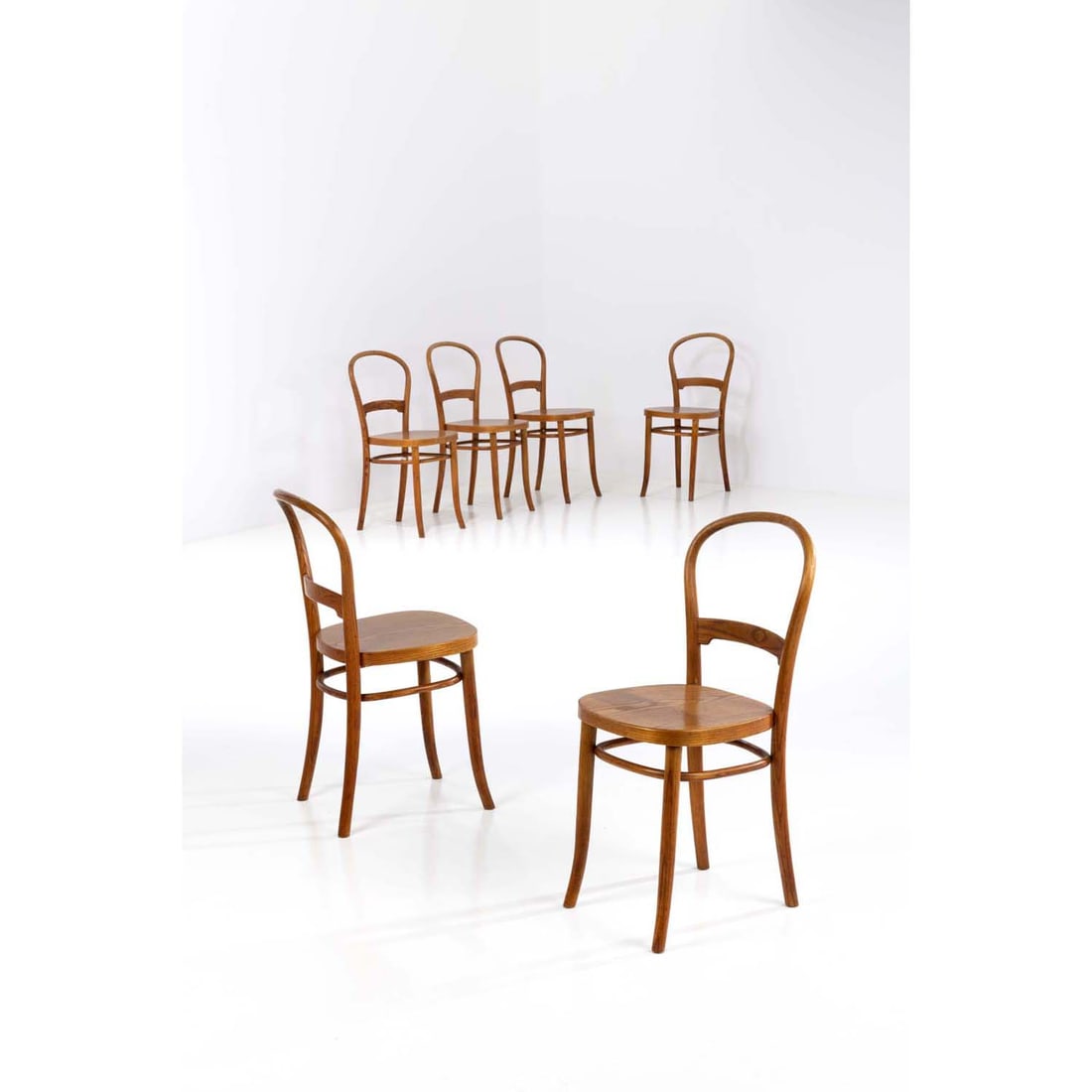 Peder Moos (1906-1991) Set of six chairs Beechwood Edited by Fritz Hansen Debossed stamp 'FH': Peder Moos (1906-1991)Set of six chairsBeechwoodEdited by Fritz HansenDebossed stamp 'FH' beneath each chairModel created in the 1930H 83,5 × L 39 × W 43 cmBibliography: Nyt tidsskrift for D