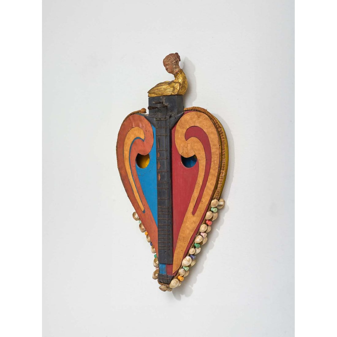 Eileen Agar (Buenos Aires, 1899 - London, 1991) The Muse Listening, circa 1940: Eileen Agar (Buenos Aires, 1899 - London, 1991) The Muse Listening, circa 1940 Painted wood lyre, collage, shells, ropes, with a bird's shape in sculpted and gilded wood and an antique style head in t