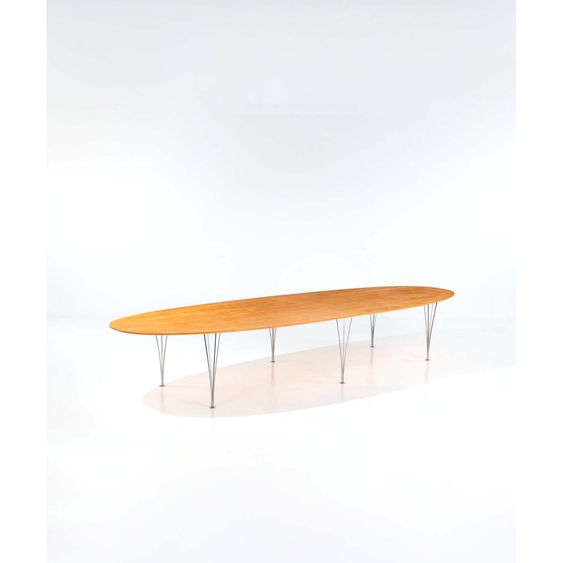 Piet Hein (1905-1995) and Bruno Mathsson (1907-1988) Model B415 Large 'Superellipse' dining table: Piet Hein (1905-1995)and Bruno Mathsson (1907-1988)Model B415Large 'Superellipse' dining tableKarelia birch and chromed metalEdited by Mathsson InternationalManufacturer's plaquesModel created in 1964