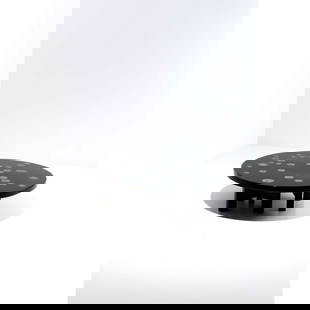 Ado Chale (born 1928) Coffee table: Ado Chale (born 1928)Coffee tableMarcasite, resin and lacquered metalModel created circa 1965H 36 × Ø 120 cmThe buyer can be provided with an authenticity certificate.