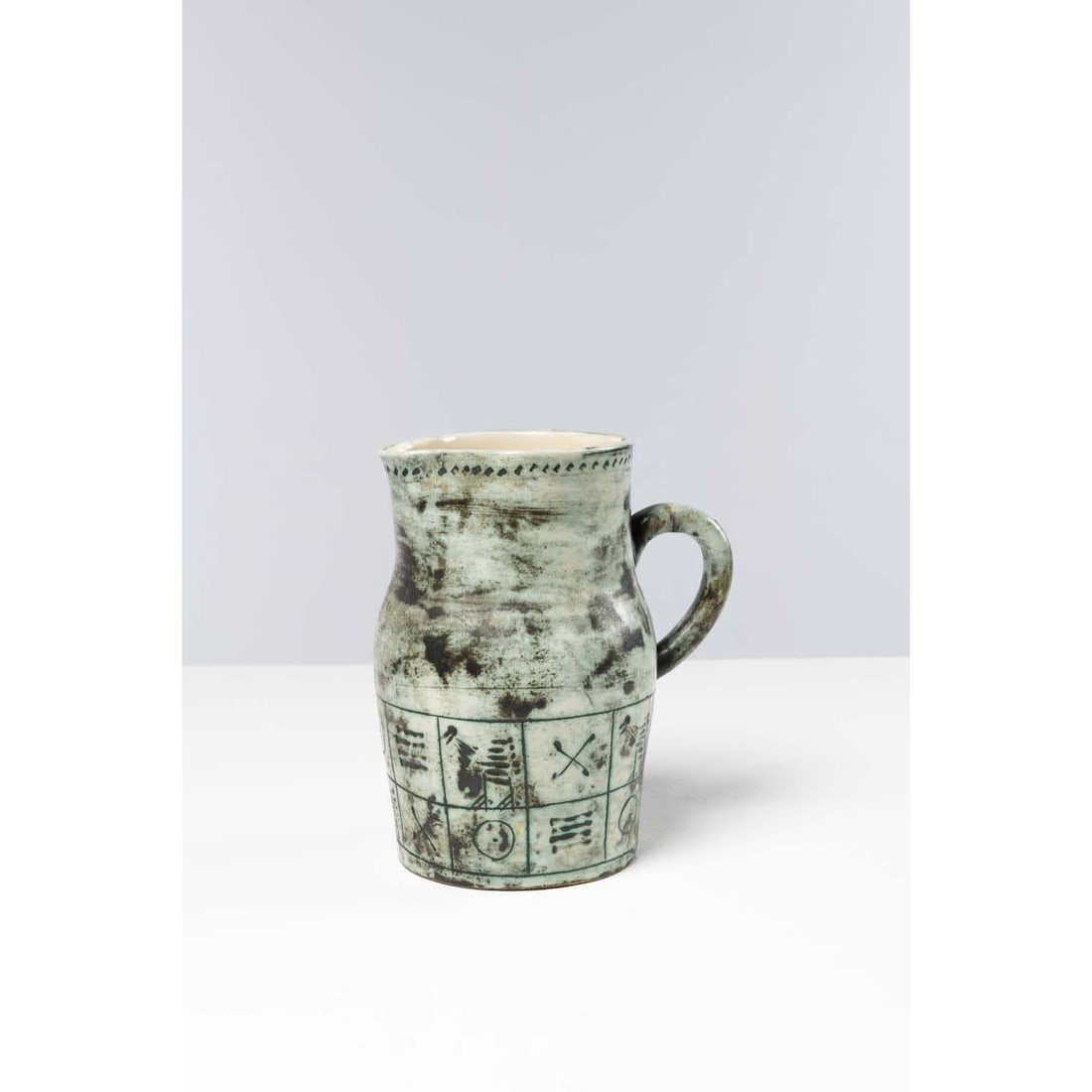 Jacques Blin (1920 - 1995) Pitcher with handle: Jacques Blin (1920 - 1995)Pitcher with handleGlazed ceramicSigned 'J. Blin' under the baseCreated around 1960 H 21.5 x W 19 x D 13 cmProvenance: private collection, France