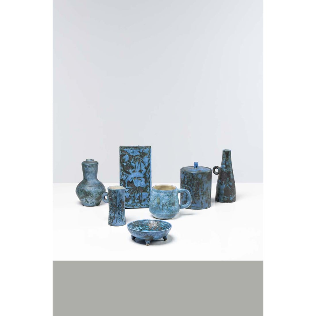Jacques Blin (1920 - 1995) Set including :: Jacques Blin (1920 - 1995)Set including :Two vases, a jug, a covered pot, a dish, a cup and a wall plaque Enamelled ceramicSigned 'J. Blin' under the baseCreated circa 1960 H 19 x Ø 7.5 cm, H 17