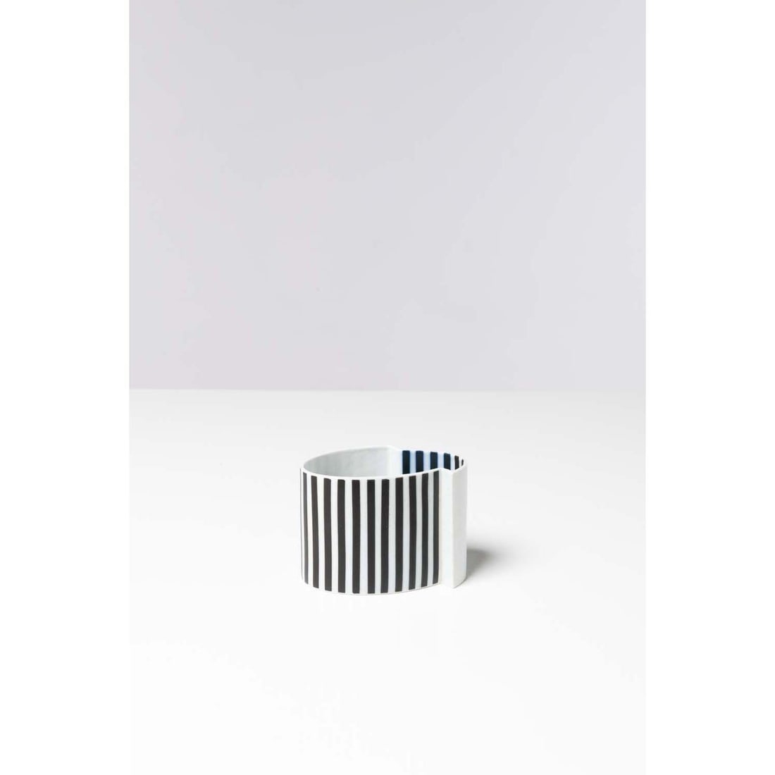 Bodil Manz (born in 1943) Cylindre type I n°29 - Unique piece: Bodil Manz (born in 1943)Cylindre type I n°29 - Unique pieceVasePorcelainSigned 'Bodil Manz' and artist’s pictogram beneath the baseModel created in 2006H 8,5 × L 12 × W 8 cmThe b