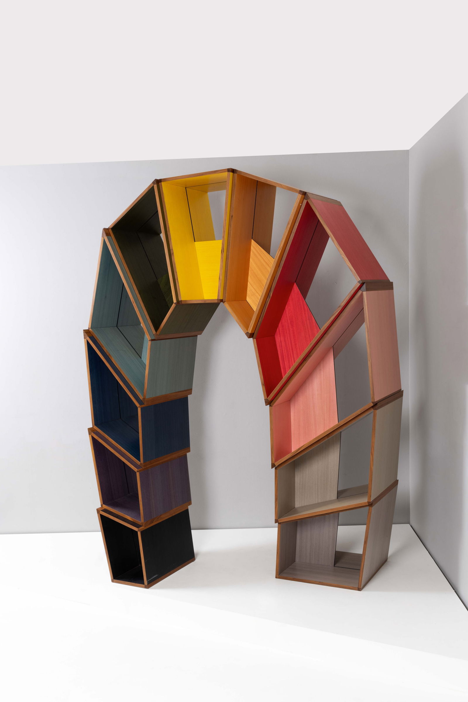 Martino Gamper (born 1971) Arco della Pace - Unique piece: Martino Gamper (born 1971)Arco della Pace - Unique piece Bookshelf Colored veneer and poplar plywoodEdited by NilufarModel created in 2009H 270 × W 204 × D 113 cmExhibition: Triennale di Mil