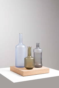 Matteo Thun (born 1952) Alla Morandi - N°14/30: Matteo Thun (born 1952)Alla Morandi - N°14/30Set of three bottlesBlown glass and stoneEdited by VeniniManufacturer's labelSigned, dated and numbered 'Venini, 2015 14/30 Matteo Thun'Model created