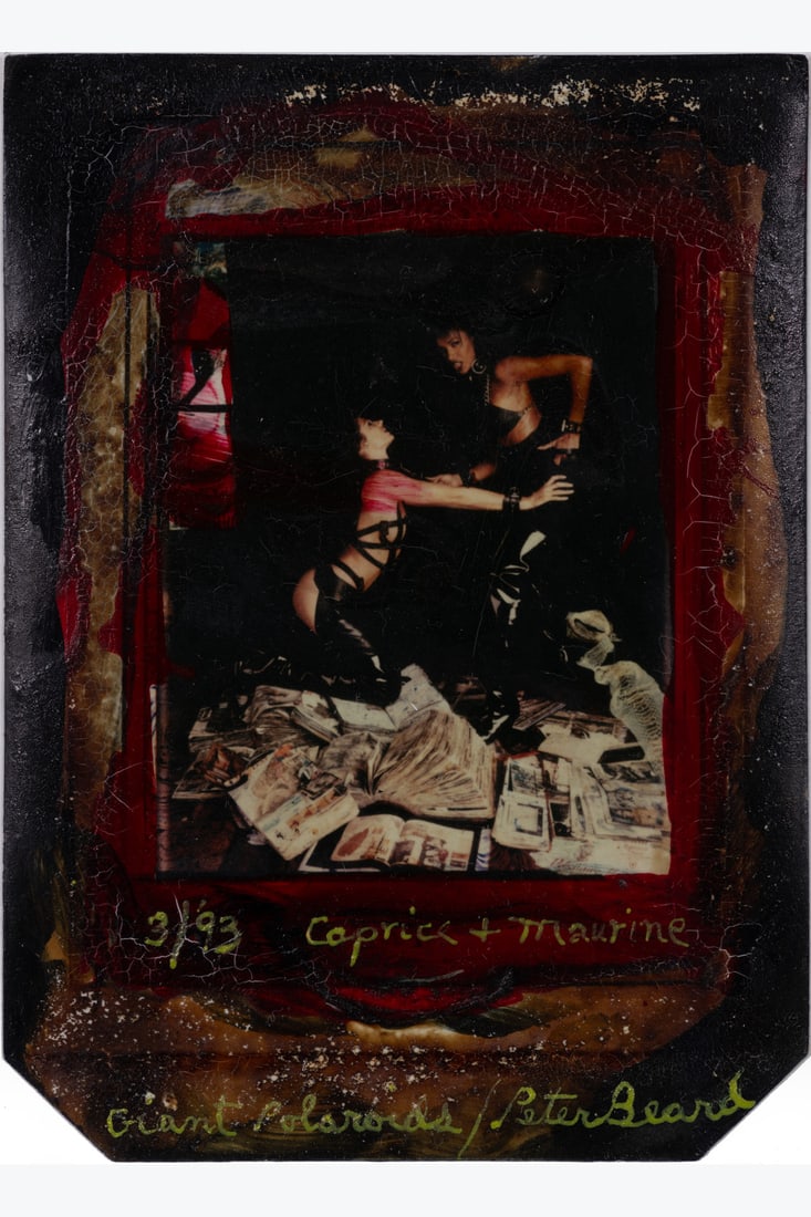 Peter Beard (1938-2020) Caprice + Maurine, March 1993 Mixed media on Polaroid print Signed, dated,: Peter Beard (1938-2020)Caprice + Maurine, March 1993Mixed media on Polaroid printSigned, dated, titled and annotated on the bottom center14 x 10,5 cmBears archive number n°2122 on a Peter Beard S