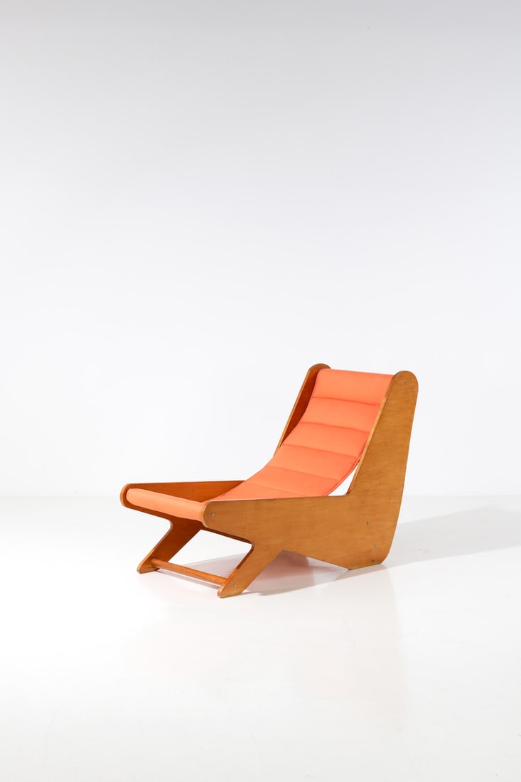 Jose Zanine Caldas (1919-2007) Chaise longue: Jose Zanine Caldas (1919-2007)Chaise longuePlywood, metal and fabricFirst artist's reeditionHot stamped 'Zanine'Model created circa 1990H 90 × L 127 × W 58 cmBibliography : José Zanine