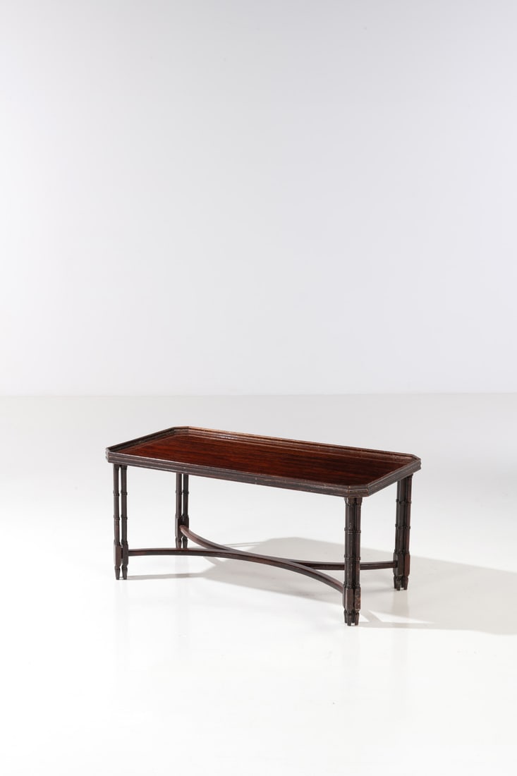 Madeleine Castaing (1894-1992) Low table: Madeleine Castaing (1894-1992)Low tableFlamed mahogany veneerModel created circa 1950H 47 x W 101 x D 41 cmProvenance: Private collection, Paris