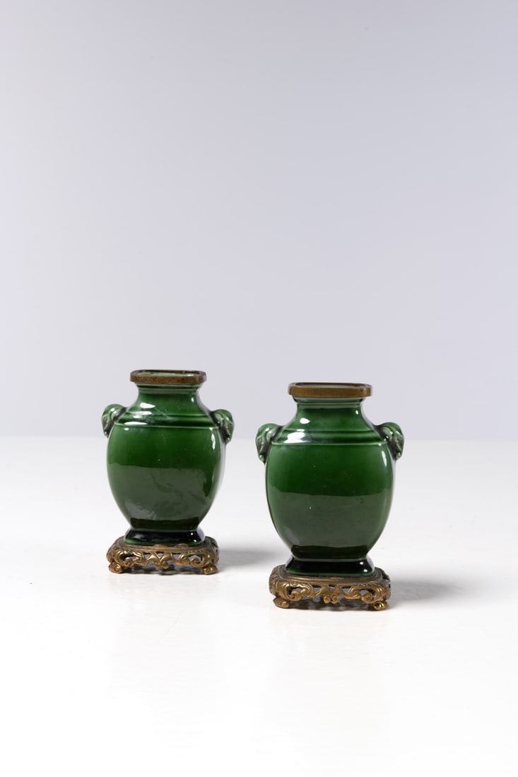 Théodore DECK (1823-1891) Pair of small vases with elephants: Théodore DECK (1823-1891) Pair of small vases with elephantsGilt bronze and enamelled ceramicMonogrammed on the reverse ‘THD’ and pictogramModel created around 1880H 11 cm