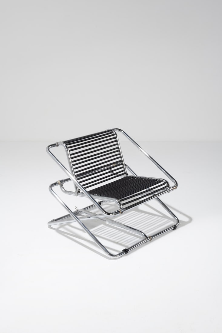 Ron Arad (born 1951) Rocking Chair Chromed steel and plastic One Off Edition Created in 1981 H 64: Ron Arad (born 1951)Rocking ChairChromed steel and plasticOne Off EditionCreated in 1981H 64 (adjustable) x W 76 x D 76 cmBibliography : 'Ron Arad, no discipline', Editions du Centre Pompidou, 2008, s