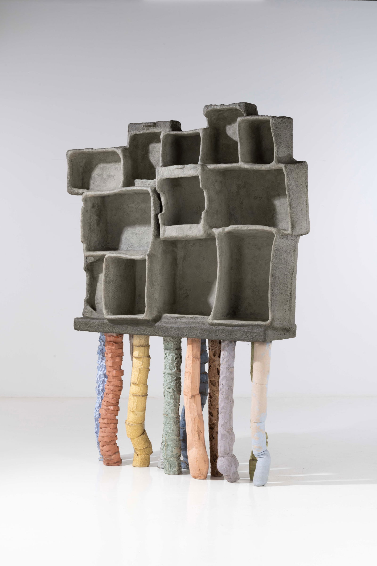 Nacho Carbonell (born 1980) Wall-mounted cabinet - 'Fossil' model: Nacho Carbonell (born 1980)Wall-mounted cabinet - 'Fossil' modelUnique piecePainted concrete, metal and resin-coated papier-machéEdited by Rossana OrlandiModel created in 2016H 216 × L 153 &