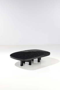 Ado Chale (born 1928) Coffee table - 'Haricot' model: Ado Chale (born 1928)Coffee table - 'Haricot' modelHematite, resin and lacquered metal'Chale' signature engraved in bronze on the edge Model created circa 1955H 35 × L 152 × W 104 cmThe buye