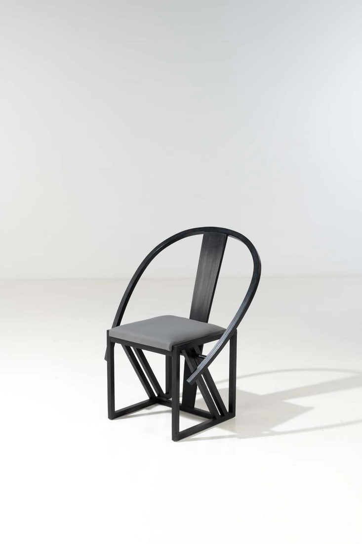 Pascal Mourgue (1943-2014) Contrast: Pascal Mourgue (1943-2014)ContrastArmchairBlackened wood and fabricModel created in 1982Edited by Forum diffusionH 88 x W 72 x D 58 cmNote : One example in the Musée des Arts Décoratifs, Par