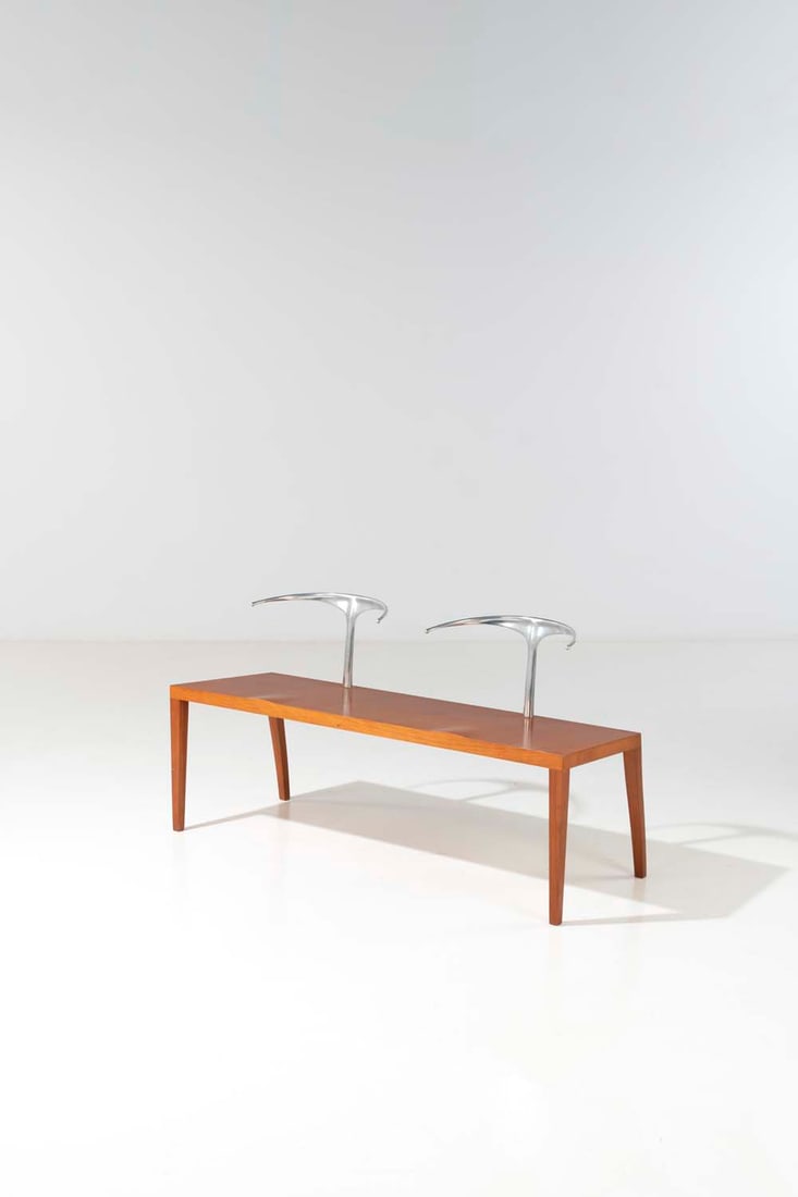 Philippe Starck (born 1949) Royalton: Philippe Starck (born 1949)RoyaltonBench seatFruitwood veneer and aluminiumStamped under the base Starck and AlephModel created in 1986Aleph publisherH 71 x W 133 x D 51.5 cmBibliography : Charlotte &