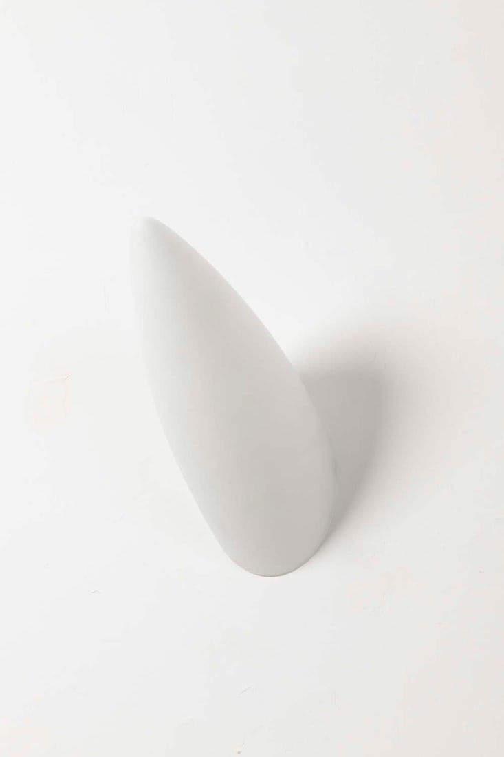 Philippe Starck (born 1949) Luci fair: Philippe Starck (born 1949)Luci fairWall lampOpaque glassModel created in 1989Edited by FlosH 30 x W 25 x D 15 cm