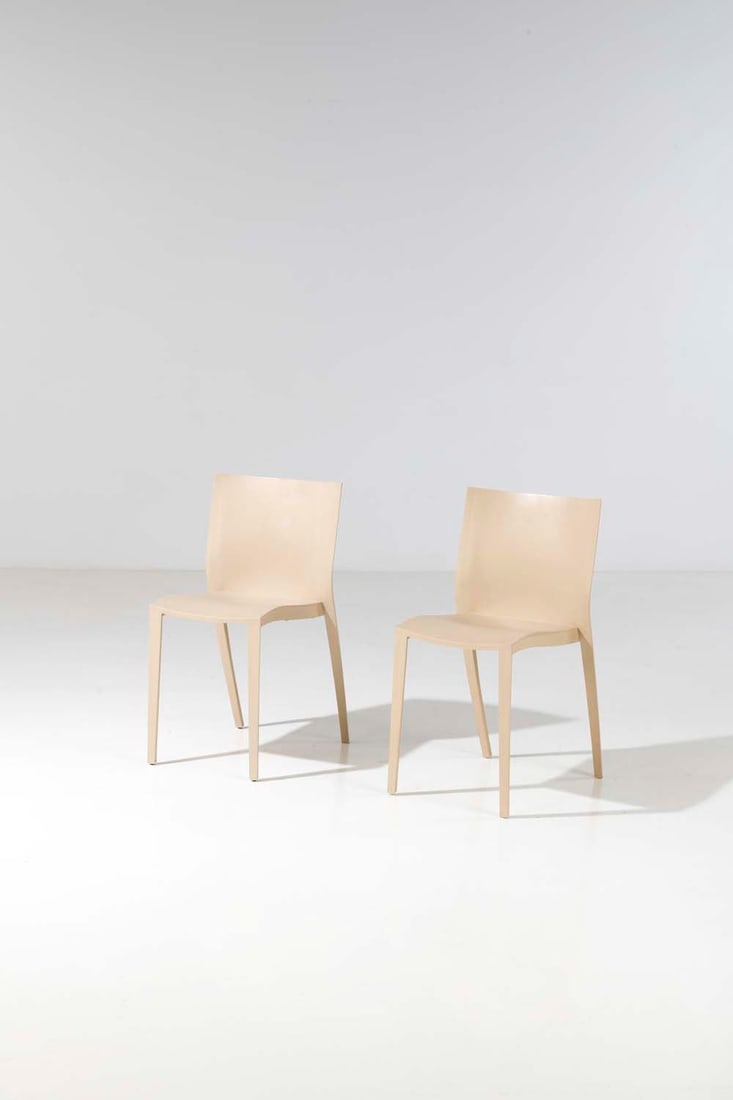 Philippe Starck (born 1949) Slick Slick: Philippe Starck (born 1949)Slick SlickPair of stackable chairsOne-piece frame and seat in polypropyleneCreated in 1999Publisher XOSigned on the backH 80 x W 43 x D 50 cmNote : one copy in the Centre P
