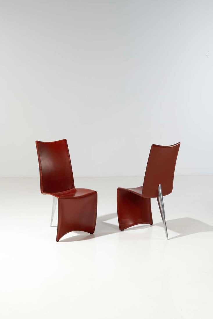 Philippe Starck (born 1949) Ed Archer: Philippe Starck (born 1949)Ed ArcherPair of chairsPolished metal and quilted havana leatherCreated in 1986Signed under the basePublisher AlephH 95 x W 38 x D 54 cm
