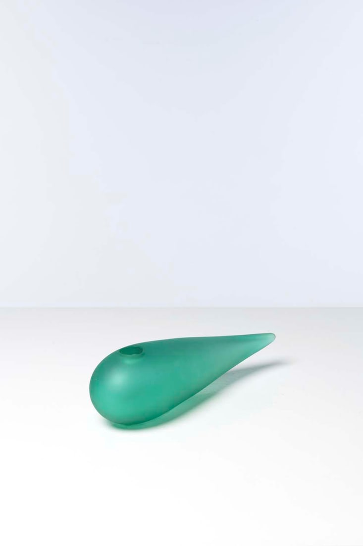 Philippe Starck (born 1949) and Daum crystal works Une étrangeté: Philippe Starck (born 1949) and Daum crystal worksSoliflore ‘Une petite étrangeté’VaseTinted glassCreated in 1986Signed on the reverseH 10 x W 37 x D 9 cm