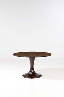 Giulio Moscatelli (1917-1994) Dining table: Giulio Moscatelli (1917-1994) Dining table Walnut and mahogany veneer Edited by Meroni Model created circa 1964 H 74 x Ø 127,5 cm