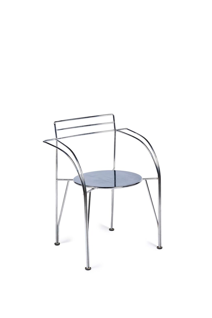 Pascal MOURGUE (1943-2014) 'Lune d'argent' chair Chromed steel wire and sheet metal Fermob edition: Pascal MOURGUE (1943-2014)'Lune d'argent' chairChromed steel wire and sheet metalFermob editionModel created in 1985H 76 x W 61 x D 50 cm