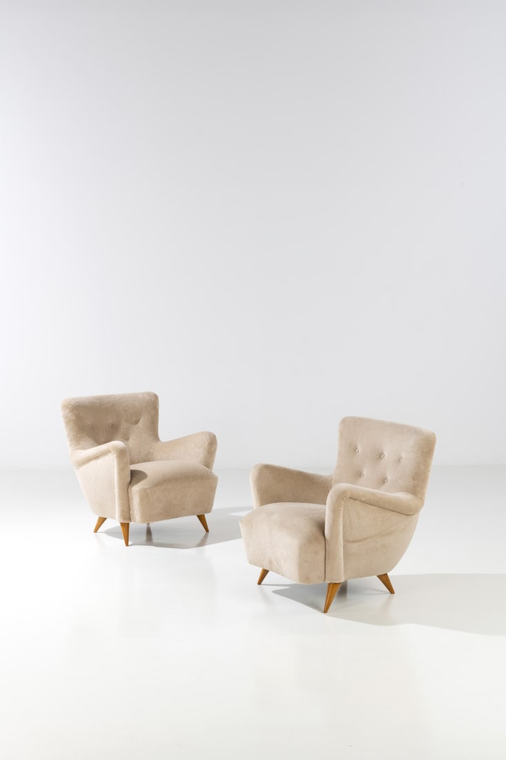 Charles Ramos (born 1925) Pair of armchairs: Charles Ramos (born 1925)Pair of armchairsOak wood and fabricEdited by ErtonModel created circa 1950H 78 × L 74 × W 70 cm