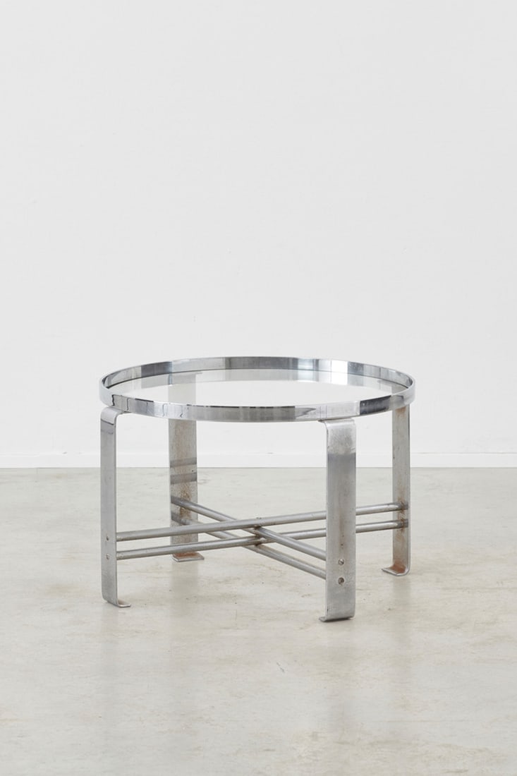 Wolfgang Hoffmann (20th) Coffee table Chromed metal and glass Edition Howell Company Model created: Wolfgang Hoffmann (20th)Coffee tableChromed metal and glassEdition Howell CompanyModel created around 1930H 43 × Ø 67 cm
