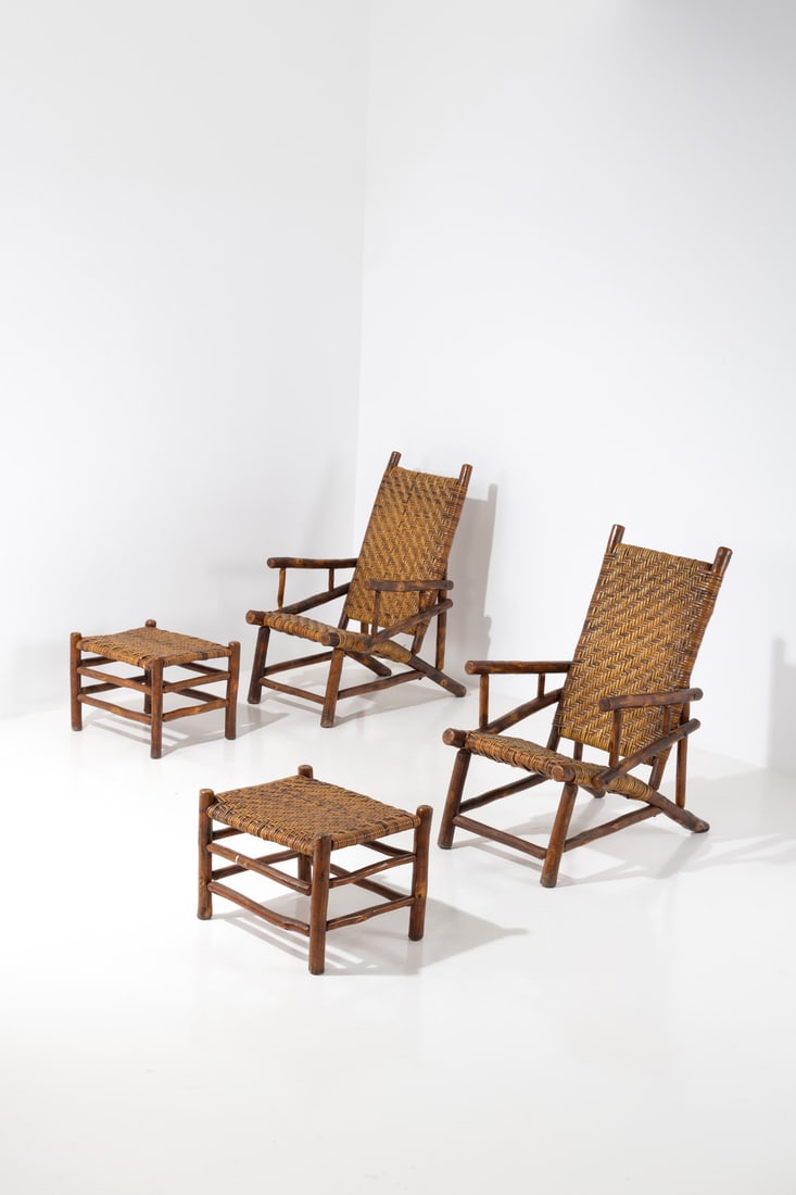 Old Hickory Furniture Company (20th c: Old Hickory Furniture Company (20th c.)Pair of armchairs and footrestsVarnished white walnut and caningModel created circa 1910H 105 × L 62 × W 88 cm (armchair)H 41 × L 54 × W 46 c