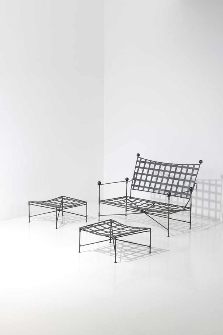 Mario Papperzini (20th c: Mario Papperzini (20th c.)Garden sofa and two footrestsWrought ironEdited by SalteriniModel created in the 1960sH 92 × L 125 × W 80 cm (sofa)H 30 × L 63 × W 56,5 cm (footrests)