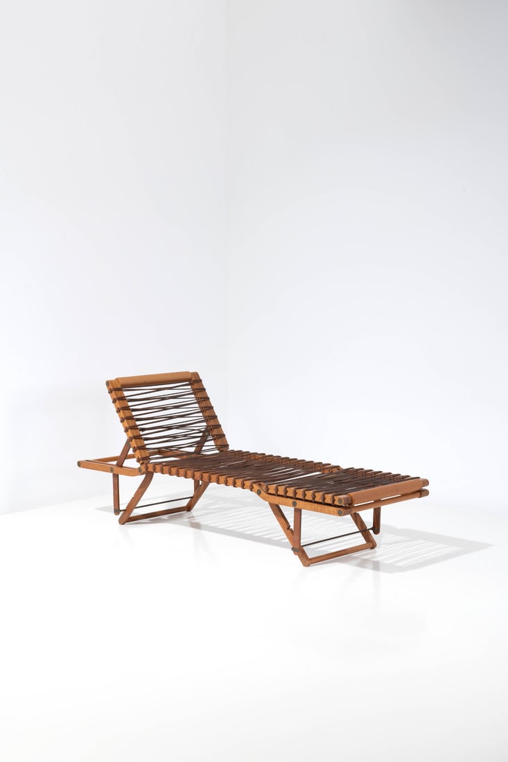 Rena Dumas (1938-2009) & Peter Coles (1955-1985) Travel chaise longue 'Pippa' collection Pear tree: Rena Dumas (1938-2009) & Peter Coles (1955-1985)Travel chaise longue'Pippa' collectionPear tree wood, brass and leatherEdited by HermesModel created in 1986H (adjustable) 90,5 X L 200 X W 68,5 cm