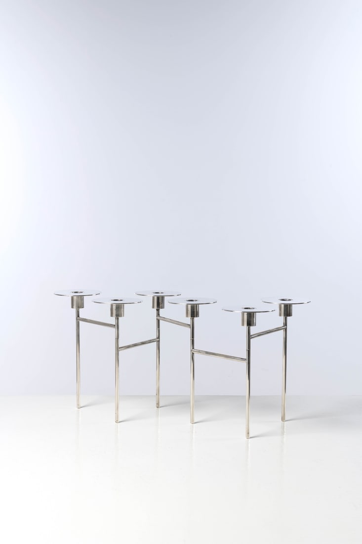 Martin Szekely (born 1956) Candleholder - 'Radius' model Silver metal and glass Edited by Christofle: Martin Szekely (born 1956)Candleholder - 'Radius' modelSilver metal and glassEdited by ChristofleIncised signature 'Szekely' and silversmith's hallmark beneath a drip trayModel created in 2006H 24,5 X