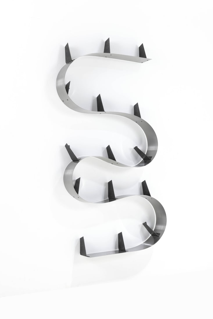 Ron Arad (born 1951) Bookcase - 'Bookworm' model Steel and patinated metal Edited by Ron Arad Studio: Ron Arad (born 1951)Bookcase - 'Bookworm' modelSteel and patinated metalEdited by Ron Arad StudioIncised signature 'Ron Arad'Model created in 1993In this configuration: H 174,5 X L 87 X W 15,5 cmTotal