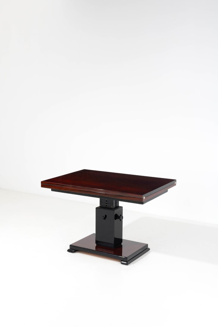 Otto Wretling (1876-1971) Table with folding tabletop, 'Idealbord': Otto Wretling (1876-1971)Table with folding tabletop, 'Idealbord'Mahogany and metalManufacturer's label beneath the tabletopModel created in 1936H 72 (adjustable) × L 112 (opened: 224) × W 8