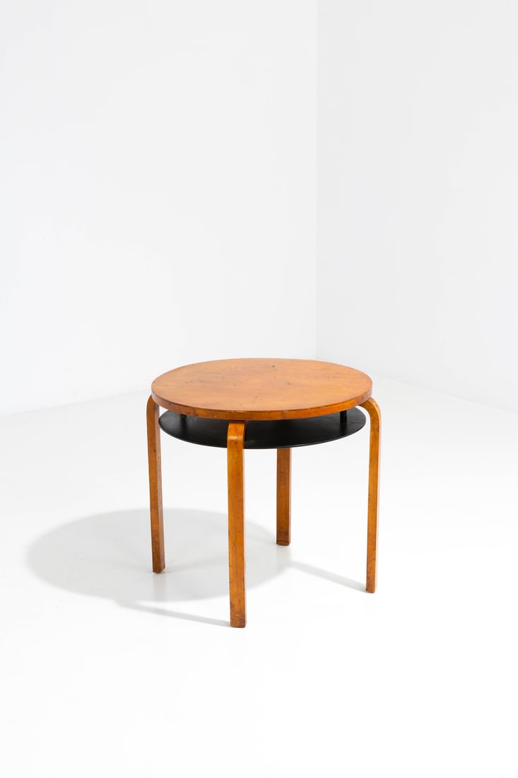 Alvar Aalto (1898-1976) Side table, model n°70: Alvar Aalto (1898-1976)Side table, model n°70BirchEdited by Oy Huonekalu - ja RakennustyötehdasModel created in 1933H 62 × Ø 69 cmBibliography: 'Alvar & Aino Aalto: Collection Bisc