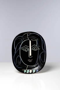 Pablo Picasso (1881-1973) Visage de femme (A.R. 220): Pablo Picasso (1881-1973)Visage de femme (A.R. 220)DishPainted white faience earthenware partially engraved and enameledAnnotated with “Madoura Plein Feu/Ed. Picasso” on the backEdition of