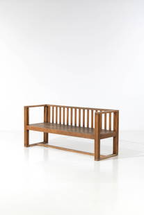 Eliel Saarinen (1873-1950) Sofa - Model 'Railway Station': Eliel Saarinen (1873-1950)Sofa - Model 'Railway Station'Pine woodModel created circa 1908-1909H 81 ×L 181 ×W 60cmNote: Model created for the Helsinki central station,Finland.Provenance: National Boa