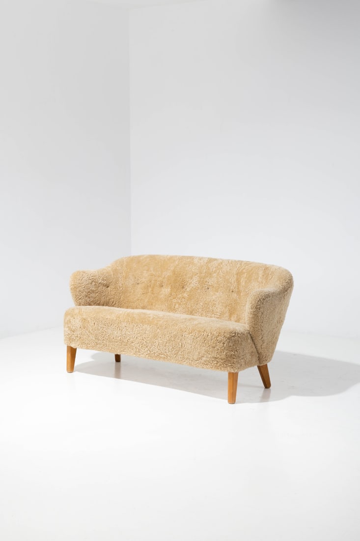 Flemming Lassen (1902-1984) Sofa: Flemming Lassen (1902-1984)SofaAsh wood and fabricEdited by Jacob KjaerModel created in the 1940sH 76×L 155×W 75cm