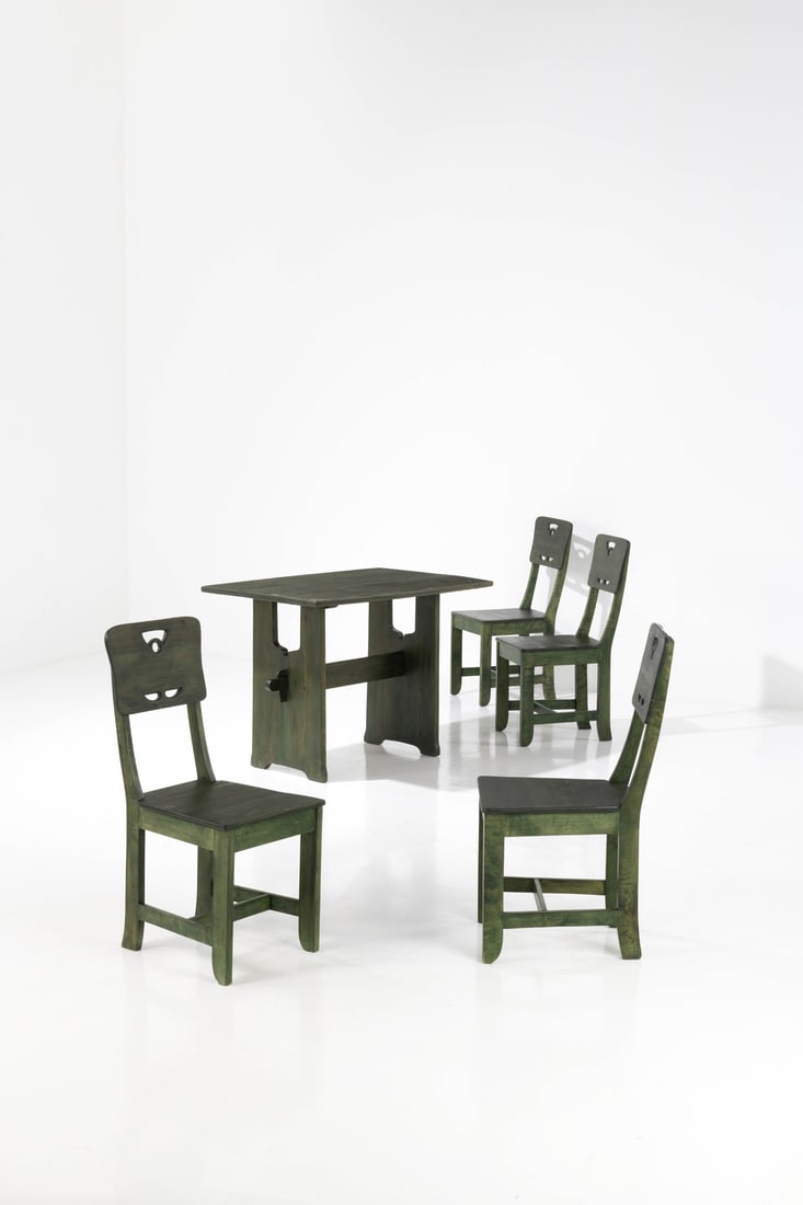 Carl Westman (1866-1936) Four chairs and a table Stained wood Model created circa 1920 Chairs: H: Carl Westman (1866-1936)Four chairs and a tableStained woodModel created circa 1920Chairs: H 93×L 40×W 47cmTable: H 78×L 109×W 72,5cm