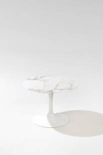 Eero Saarinen (1910-1961) Side table Marble and lacquered metal Knoll metal label under the top: Eero Saarinen (1910-1961) Side tableMarble and lacquered metalKnoll metal label under the top Edition Knoll InternationalModel created in 1957Contemporary editionH 36 × D 51 cm