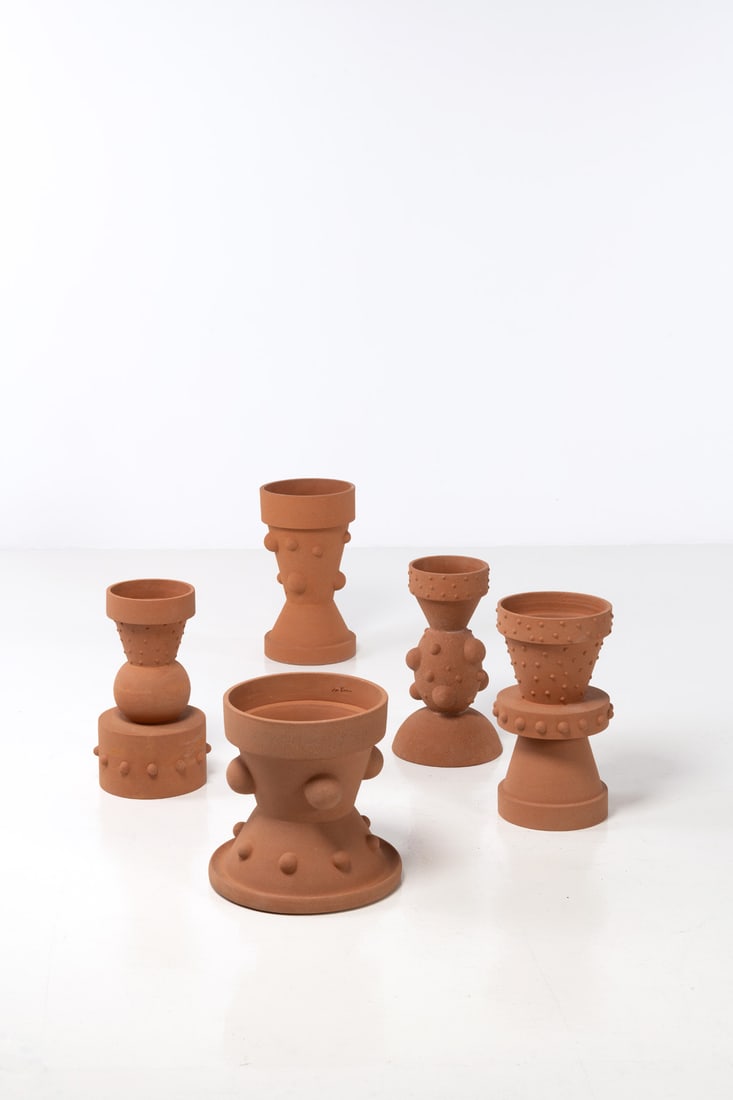 Dan Friedman (1945-1995) Folly, reversible flower pots Set of five terracotta flowerpots Each: Dan Friedman (1945-1995)Folly, reversible flower potsSet of five terracotta flowerpotsEach engraved with the designer and Sarri studio's stampsEdition of 9 + 2 H.C. proofsModel created in 199147 x 26,