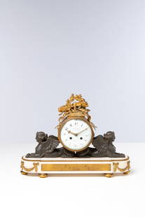 ROBIN&#160; Horloger du Roy, Paris Early 19th c: ROBIN&#160;Horloger du Roy, ParisEarly 19th c.&#160;Neoclassical decorative mantel clock in bronze, gilt and patinated bronze, and whitemarble.Case:&#8226; The clock is supported by two reclining wing