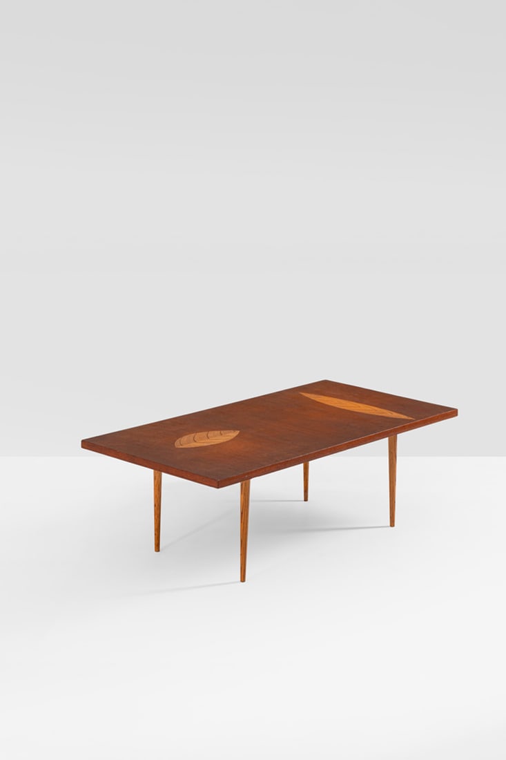 xx Tapio Wirkkala (1915-1985) Coffee table: xx Tapio Wirkkala (1915-1985)Coffee tableTeakEdited by AskoStamped with 'TAPIO WIRKKALA ASKO MADE IN FINLAND'Model created circa 1950H 41 ×L 125×W 63cmBibliography: 'Sourcebook of Scandinavi