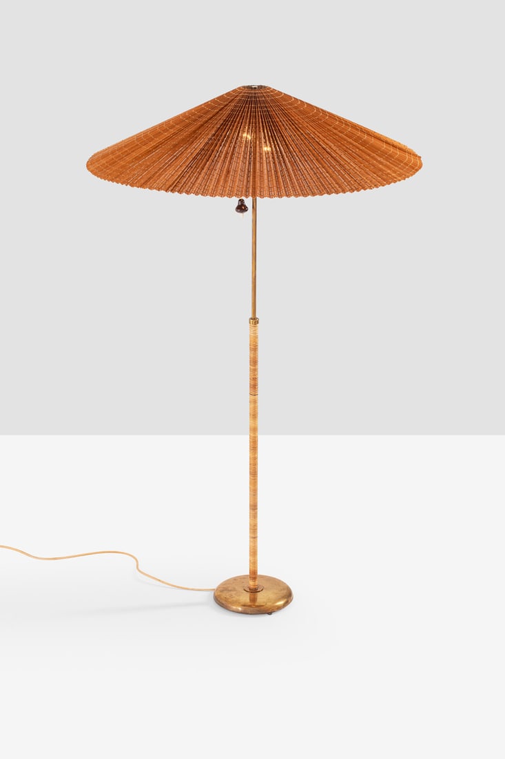 xx Gunilla Jung (1905-1939) Floor lamp: xx Gunilla Jung (1905-1939)Floor lampBrass, rattan and wood slatsEdited by OrnoModel created circa 1935H 173 (adjustable) ×Ø 103cm