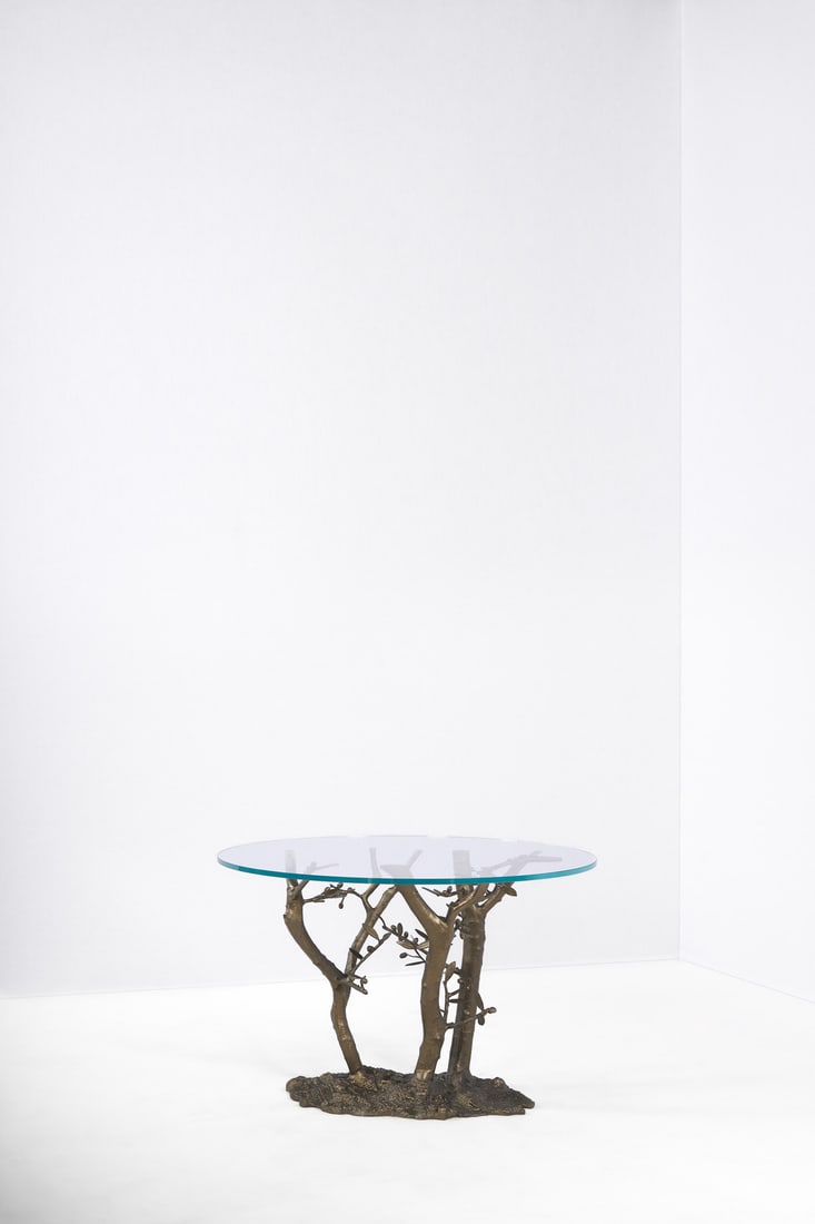 Andrea Salvetti (1967-2017) Dining table - Model ‘Olivo’: Andrea Salvetti (1967-2017)Dining table - Model ‘Olivo’No. 2/8Cast bronzed aluminium and glassSigned and numbered on the baseModel created in 2006H 70×Ø 100 cmBibliography: ‘Andrea Salvetti, E