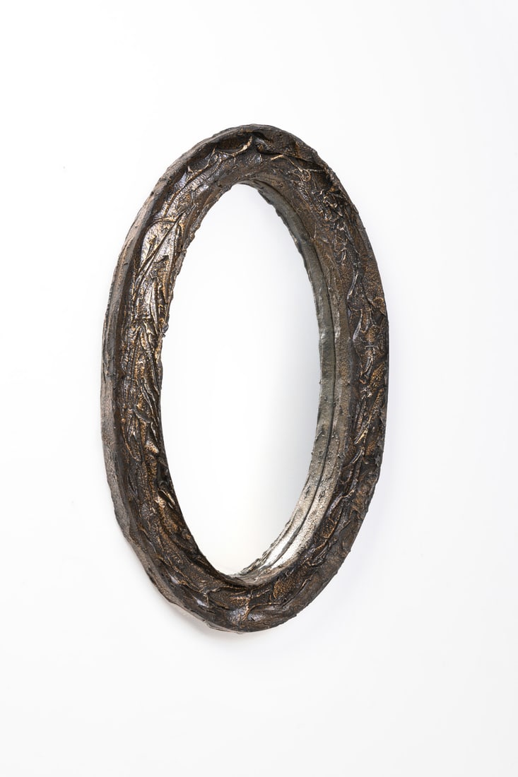 x Paul Evans (1931-1987) Wall mirror: x Paul Evans (1931-1987)Wall mirrorUnique pieceResin, coated bronze and mirrorModel created in the 1970sH 101 x W 61 x D 9 cm
