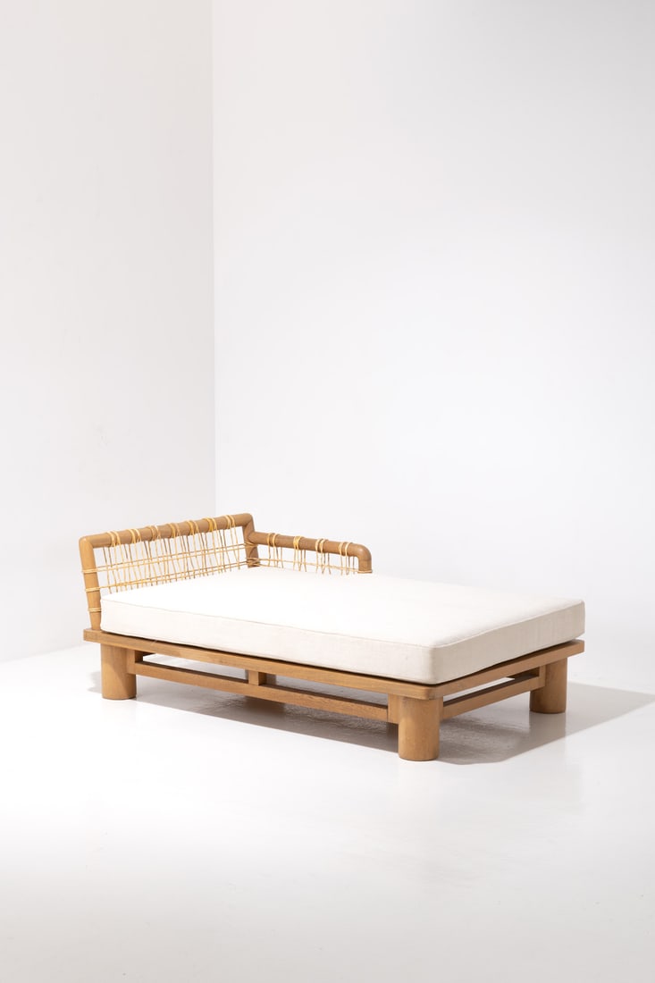 x Karl Springer (1931-1991) Daybed - 'Dowelwood' model: x Karl Springer (1931-1991)Daybed - 'Dowelwood' modelOak, rattan and fabricModel created in the 1970sH 66 x W 172 x D 112 cm