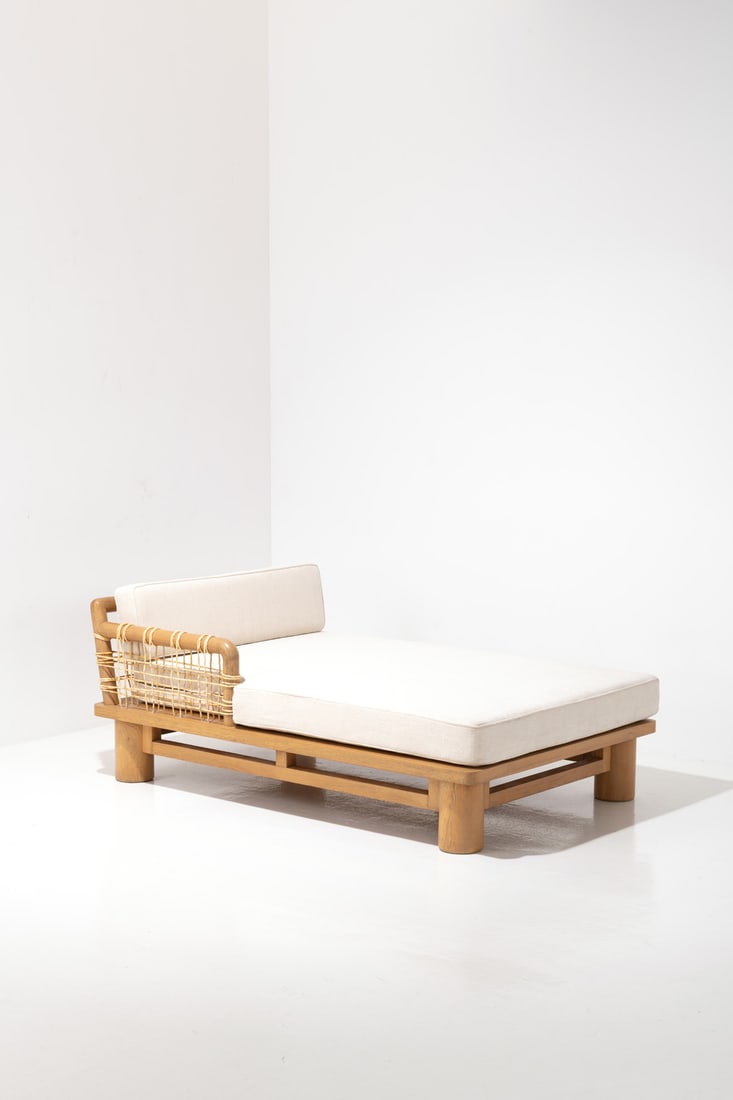 x Karl Springer (1931-1991) Daybed - 'Dowelwood' model: x Karl Springer (1931-1991)Daybed - 'Dowelwood' modelOak, rattan and fabricModel created in the 1970s H 66 x W 172 x D 112 cm