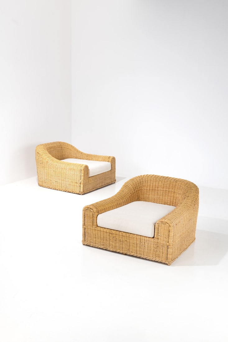 x Michael Taylor (1927-1986) Pair of armchairs - 'Jennifer' model: x Michael Taylor (1927-1986)Pair of armchairs - 'Jennifer' model Caning and fabricMichael Taylor Designs editionModel created in 1982H 68 x W 113 x D 105 cm