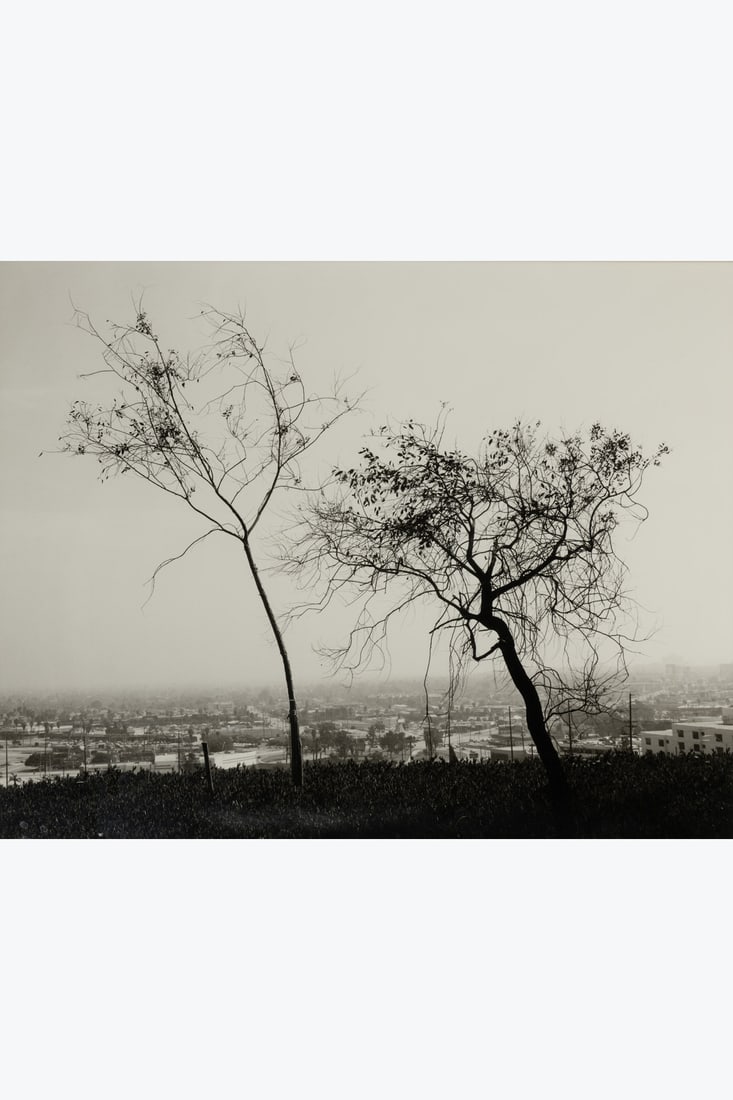 Robert Adams (1937) On Signal Hill, Overlooking Long Beach: Robert Adams (1937)On Signal Hill, Overlooking Long Beach.California, 1983.Vintage silver print (1986), signed, titled, and dated in pencil with the stamp "Copyright © by Robert Adams" on the rev