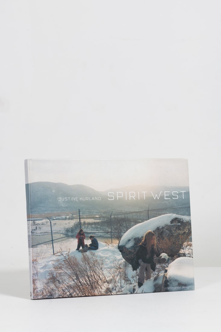 Justine Kurland (1969) Spirit West: Justine Kurland (1969)Spirit West.Coromandel Design, Paris, 2001.Oblong quarto (24 × 30.5 cm).First edition, limited to 1,500 copies.Illustrated hardcover, under protective plastic (open).