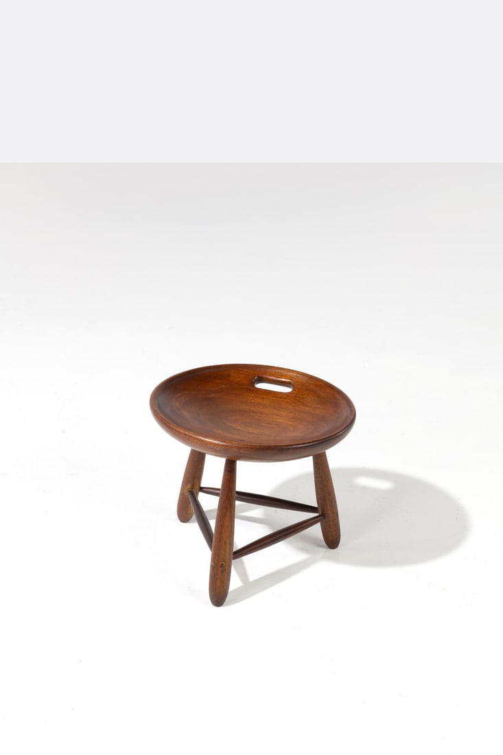 Sergio Rodrigues (1927-2014) Tripod stool – ‘Banco Mocho’ model: Sergio Rodrigues (1927-2014)Tripod stool – ‘Banco Mocho’ modelImbuiaEdited by OCAModel created in 1954H 40×Ø 34cmBibliography:– S. Cals, ‘Sergio Rodrigues, cata